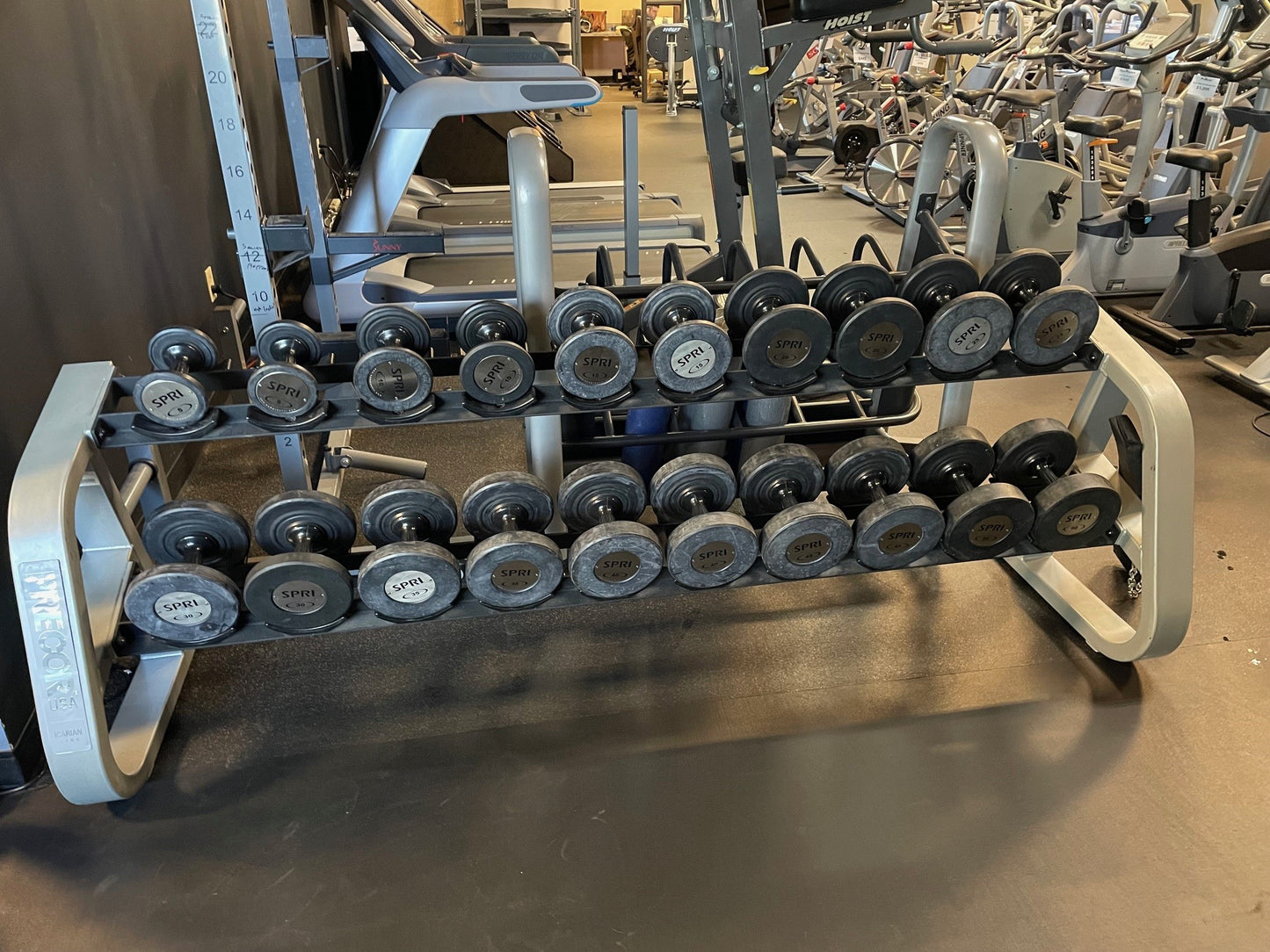 Used Pro style Dumbbell set- 5-50lbs with Precor Dumbbell Rack