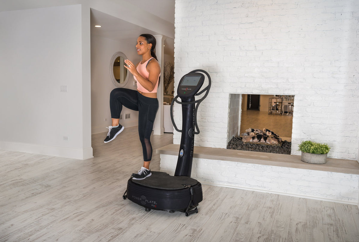 Woman doing a high-knee march on a Power Plate my8